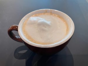 hot chocolate with foam, local coffee shop