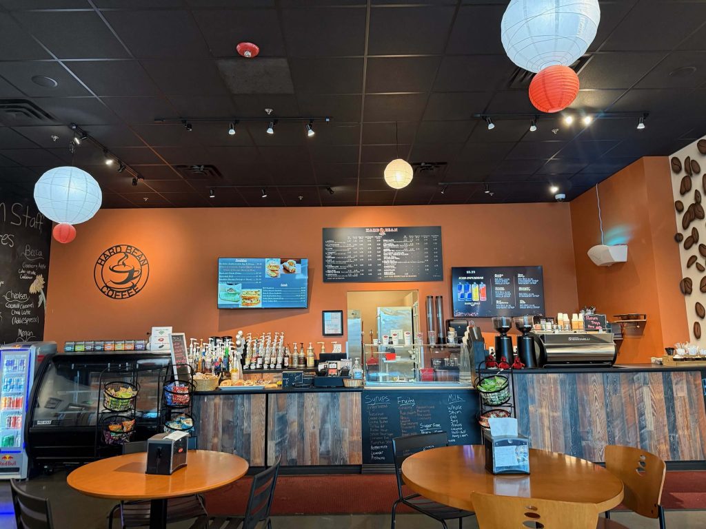 full front counter view of coffee shop